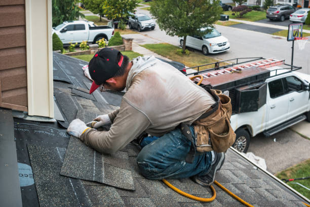 Professional Roofing technician working in Mc Donald, OH